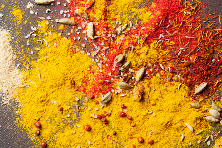 Various spices on stone table. Top viewの写真素材
