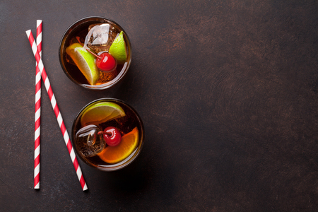 Cuba libre cocktail glasses. Top view with copy spaceの写真素材