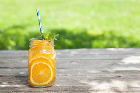 Fresh lemonade jar with summer fruits and berries. With space for your textの写真素材