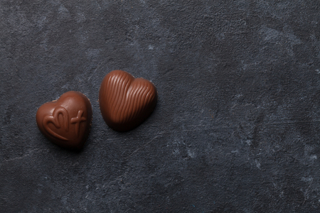 Chocolate heart sweets. Top view with space for your greetingsの写真素材
