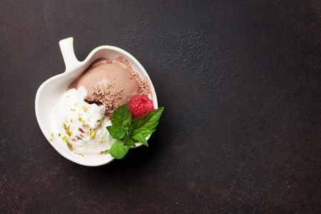 Ice cream with berries. Top view with space for your textの写真素材