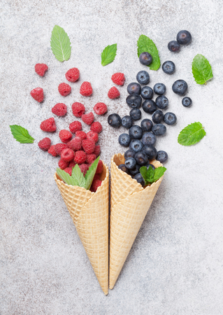 Ice cream cones with berries. Top viewの写真素材