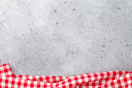 Cooking stone table with kitchen towel or napkin. Top view with space for your meal or recipeの写真素材