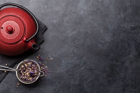 Herbal and fruit dry teas on stone table. Top view flat lay with copy spaceの写真素材