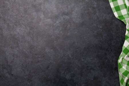 Kitchen table with tablecloth and space for your recipe or menu. Top view flat layの写真素材