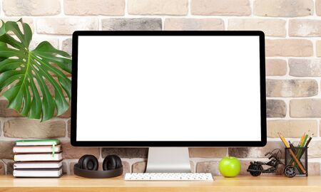 Stylish home studio workspace with computer and headphones. Work from home concept. With blank...