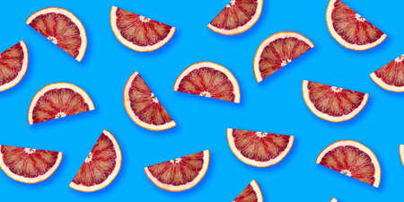 Orange citrus slices seamless backdrop texture. Flat lay backdropの写真素材