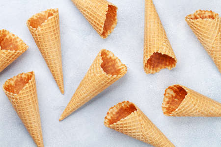 Ice cream in waffle cones. Top view flat lay