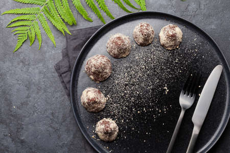 Homemade healthy vegetarian chocolate sweets. Top view flat lay with copy space