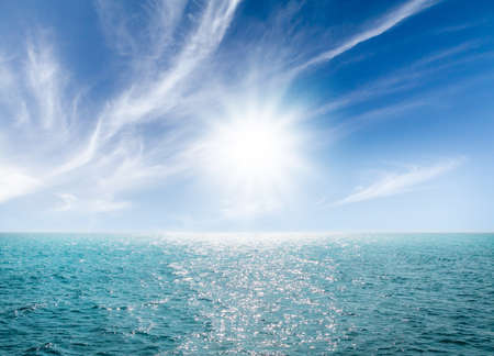 Summer tropical sea with sparkling waves and blue sunny sky