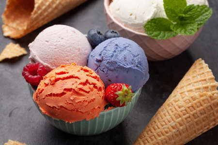 Berry and vanilla ice cream sundae. Top view flat lay with copy space
