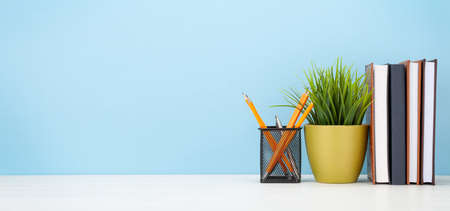 Office desk with supplies. Remote office and work from home concept. With copy space