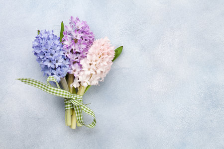 Hyacinth flowers bouquet. Easter greeting card template. Top view flat lay. With space for your greetingsの写真素材