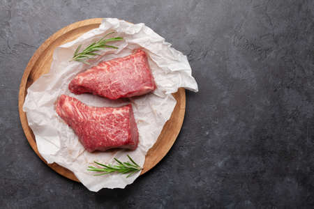 Marbled beef steak. Two fresh raw fillet steaks. Top view flat lay with copy space