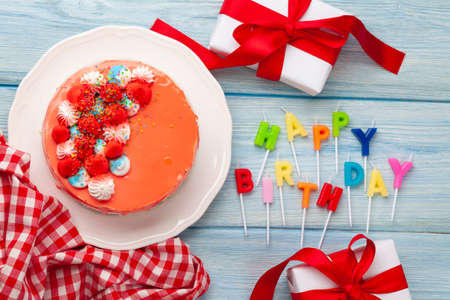 Birthday cake and happy birthday candles. Top view flat layの写真素材