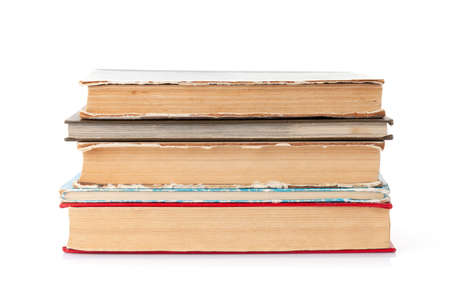 Old books stack. Isolated on white backgroundの写真素材