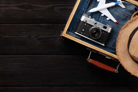 Travel and vacation concept. Luggage with trip items and clothes. Top view flat lay with copy spaceの写真素材