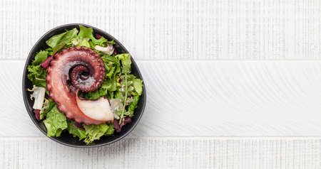 Grilled octopus with salad. Top view flat lay with copy spaceの写真素材