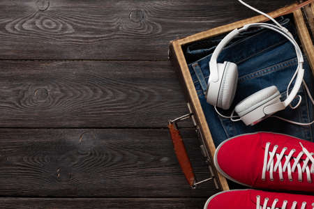 Travel and vacation concept. Luggage with trip items and clothes. Top view flat lay with copy spaceの写真素材