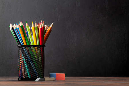 Colorful pencils and blackboard for copy space. school and education templateの写真素材
