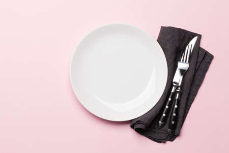 Empty plate and silverware. Top view flat lay with copy space. Template or mockup for your mealsの写真素材