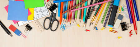 School and office supplies over office table. Flat lay with copy spaceの写真素材