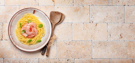 Pasta with shrimps. Italian food. Flat lay with copy spaceの写真素材
