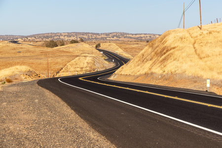 Asphalt road and country landscape of United States