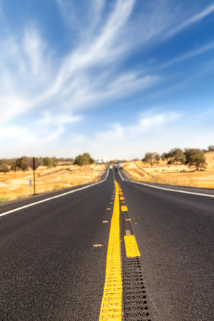 Asphalt road and countryside landscape of United States