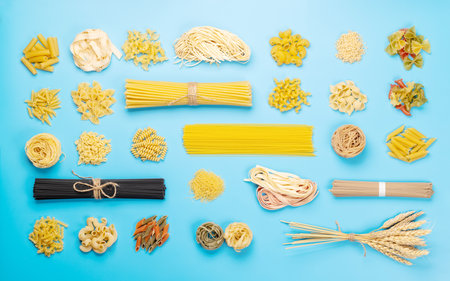 Various uncooked pasta and spaghetti. flat layの写真素材