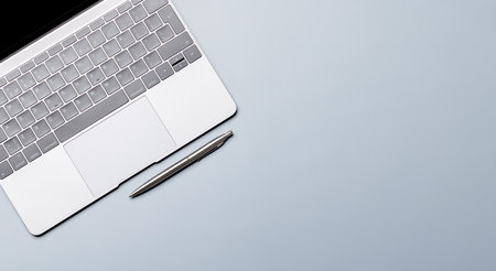 Top view business office desk with laptop. Flat lay workspace with copy spaceの写真素材