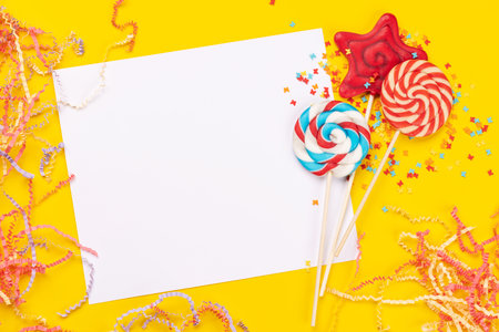 Candy sweets and blank greeting card for your greetings. flat layの写真素材