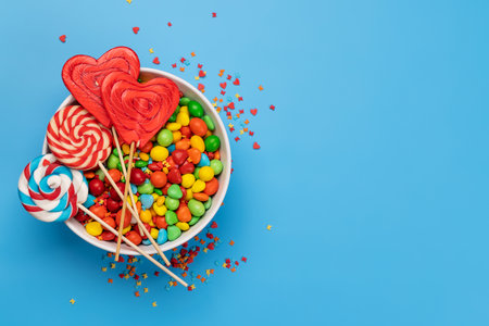 Candy sweets and copy space for your greetings. Valentines day candy hearts. flat layの写真素材