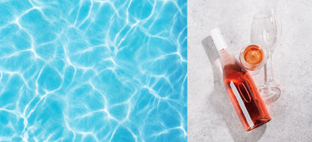 Refreshing rose wine by the pool on a sunny day, the perfect summer vacation. View from above with space for your textの写真素材