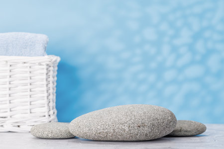 A visually appealing backdrop with smooth sea pebbles and ample copy space, perfect podium for showcasing your productの写真素材