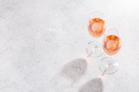 Refreshing rose wine on a sunny day, the perfect summer vacation. View from above with space for your textの写真素材