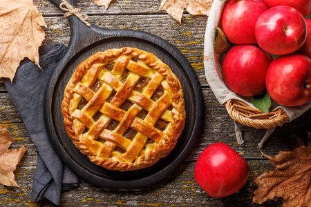 Delicious Apple Pie with Fresh Red Apples. Flat layの写真素材