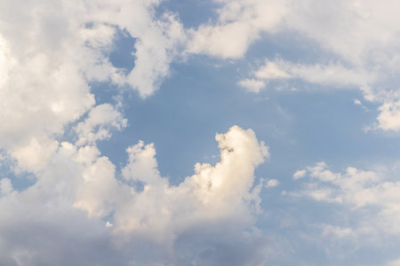 A beautiful scenic view of the sky with clouds, showcasing the natural beauty and peacefulness of...