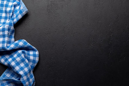 Mockup for a meal presentation: Empty table with a clean towel. Flat lay with copy space