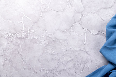 Mockup for a meal presentation: Empty table with a clean towel. Flat lay with copy spaceの写真素材