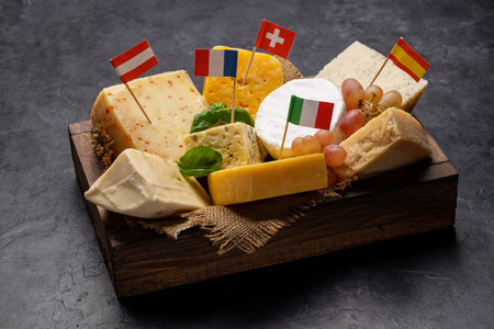 Various cheese with different Europe flagsの写真素材
