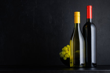 Various wine bottles over black with copy spaceの写真素材