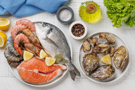 Seafood Platter Delight: Shrimps, Salmon, Oysters Galore. Flat layの写真素材