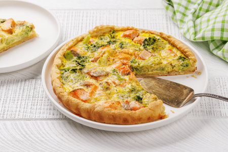 Fresh fish homemade pie with salmon and broccoliの写真素材