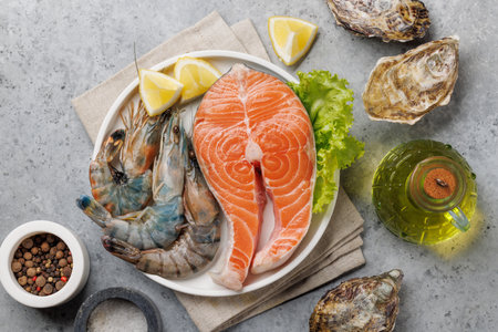 Seafood Platter Delight: Shrimps, Salmon, Oysters Galore. Flat layの写真素材