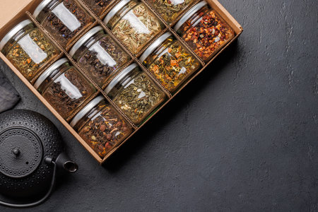 Tea time assortment: Various dry tea leaves. Flat lay with copy spaceの写真素材