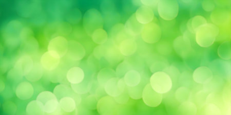 Sunny green foliage bokeh background. Ideal summer backdropの写真素材