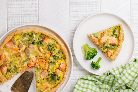 Fresh fish homemade pie with salmon and broccoli. Flat layの写真素材