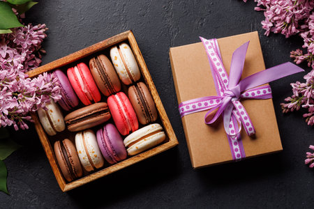 Colorful macaroons in box, arranged in a delightful display of vibrant hues and irresistible sweetnessの写真素材