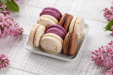 Colorful macaroons, arranged in a delightful display of vibrant hues and irresistible sweetnessの写真素材